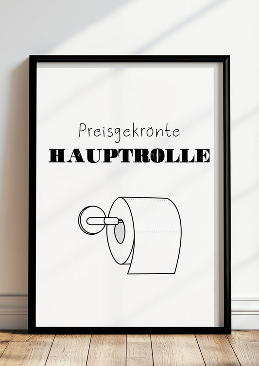 Gerahmtes Poster „Preisgekrönte Hauptrolle“ in schwarzem Rahmen, inszeniert in moderner Wohnumgebung.