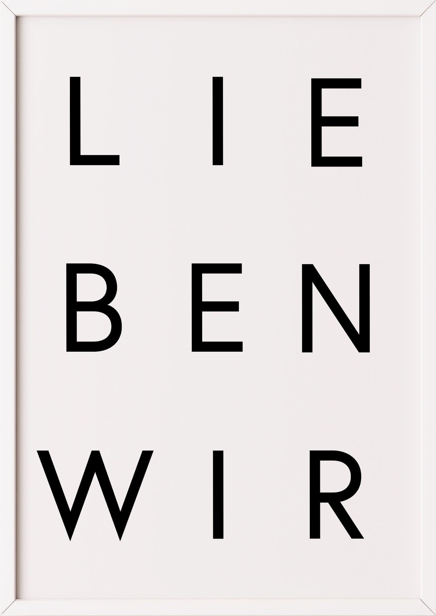 Schwarz-Weiß-Poster „LIEBEN WIR“ im weißen Holzrahmen