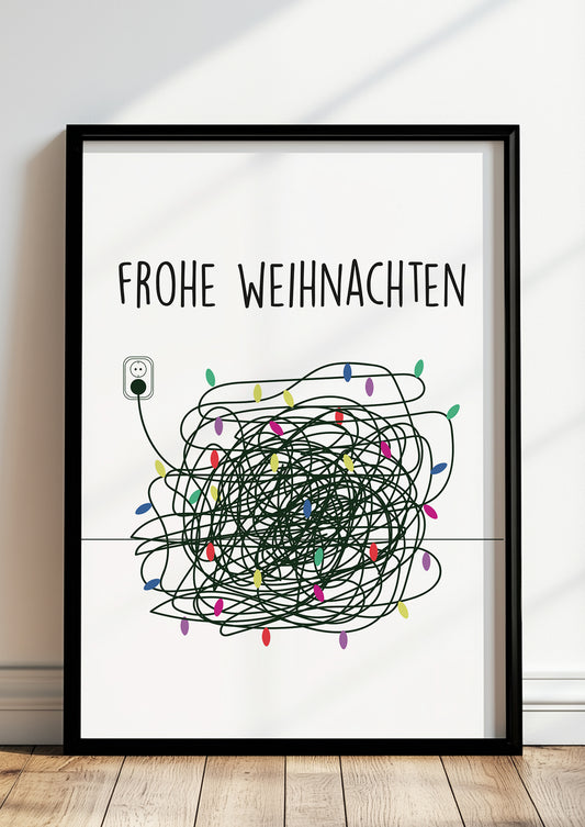 Frohe Weihnachten-Poster im schwarzen Holzrahmen steht auf dem Boden