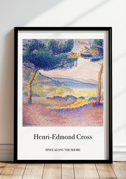 Pines Along the Shore von Henri Edmond Cross als Poster, in schwarzem Rahmen, stehend auf dem Boden, angelehnt an einer Wand