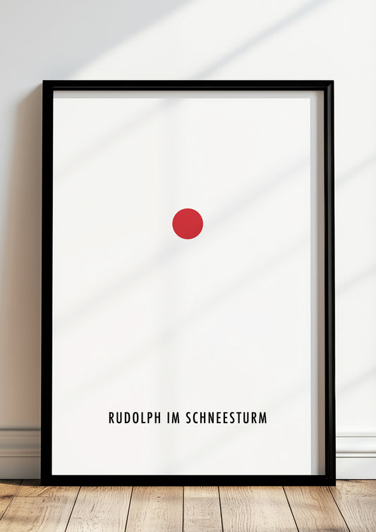 Rudolph im Schneesturm-Poster im schwarzen Holzrahmen steht auf dem Boden