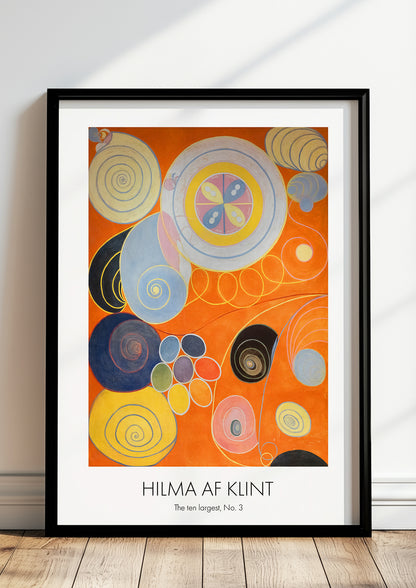 The Ten Largest, Youth, No. 3 von Hilma af Klint als Poster, in schwarzem Rahmen, stehend auf dem Boden, angelehnt an einer Wand