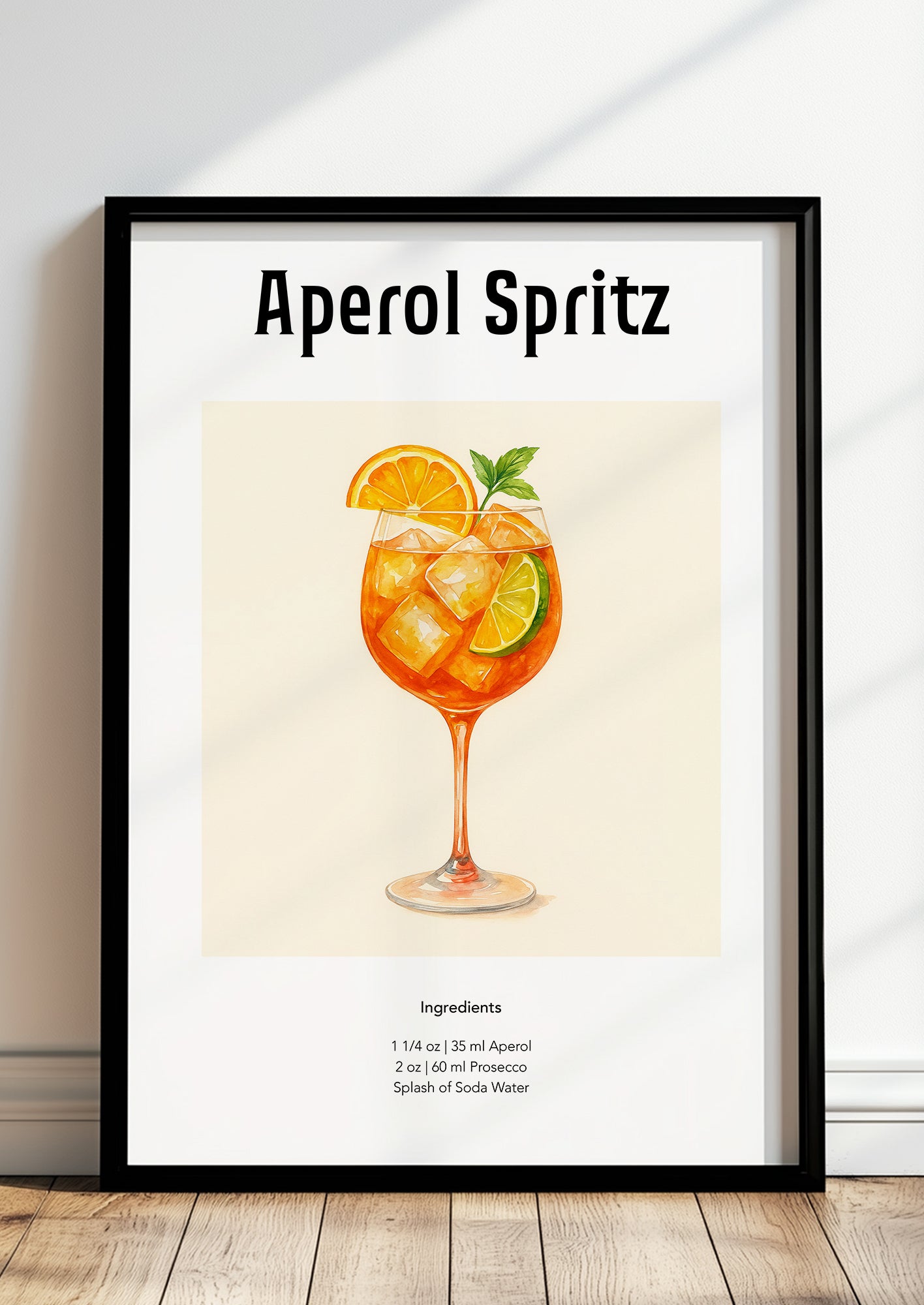 Aperol Spritz Poster im weißen Rahmen dekorativ aufgestellt vor neutralem Hintergrund