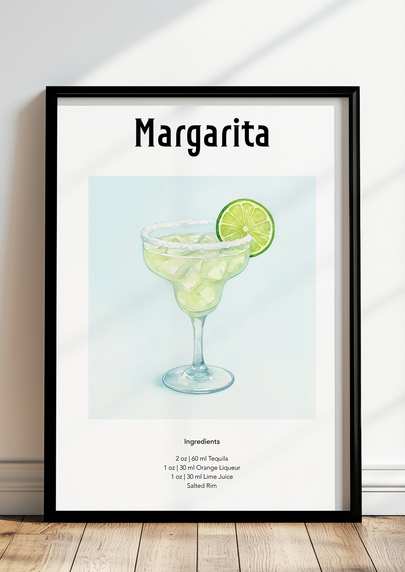 Gerahmtes Margarita Poster lehnt auf dem Boden an einer hellen Wand