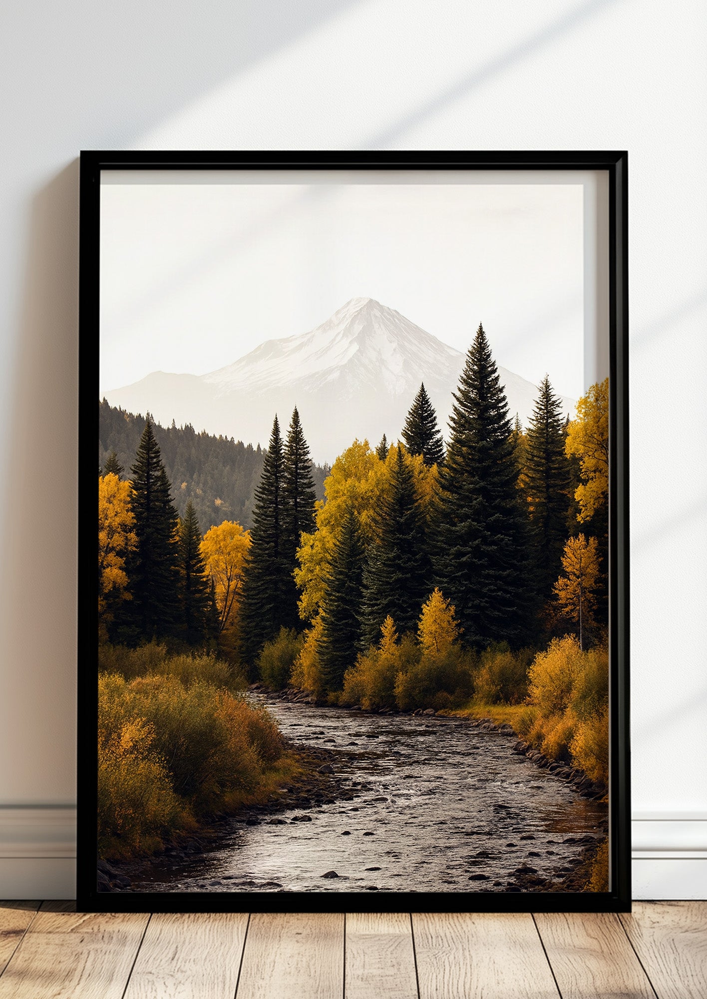 Poster Herbstwald mit Fluss und Berg im schwarzen Holzrahmen stehend
