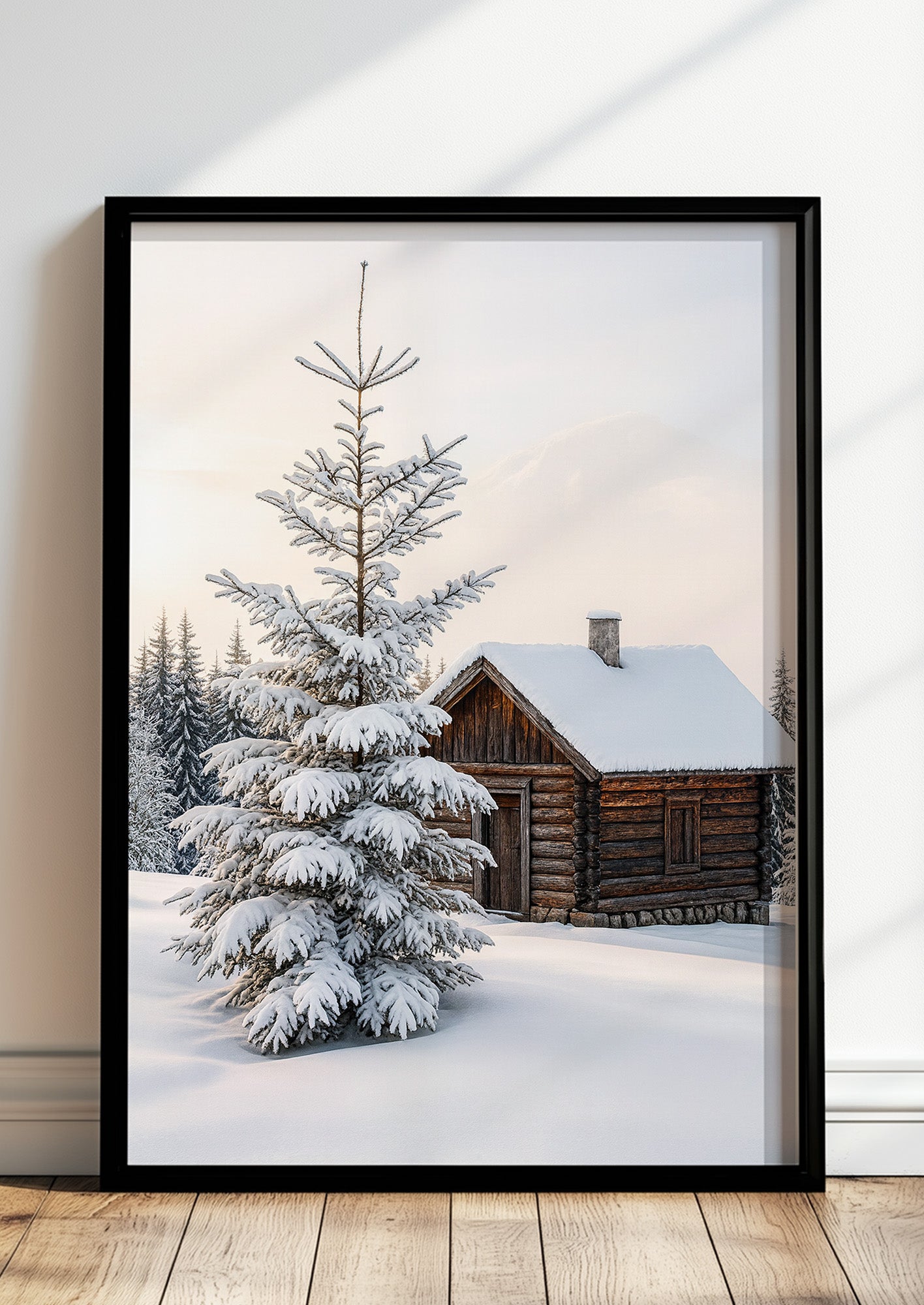 Poster Waldhütte mit Schnee bedeckt im schwarzen Rahmen stehend