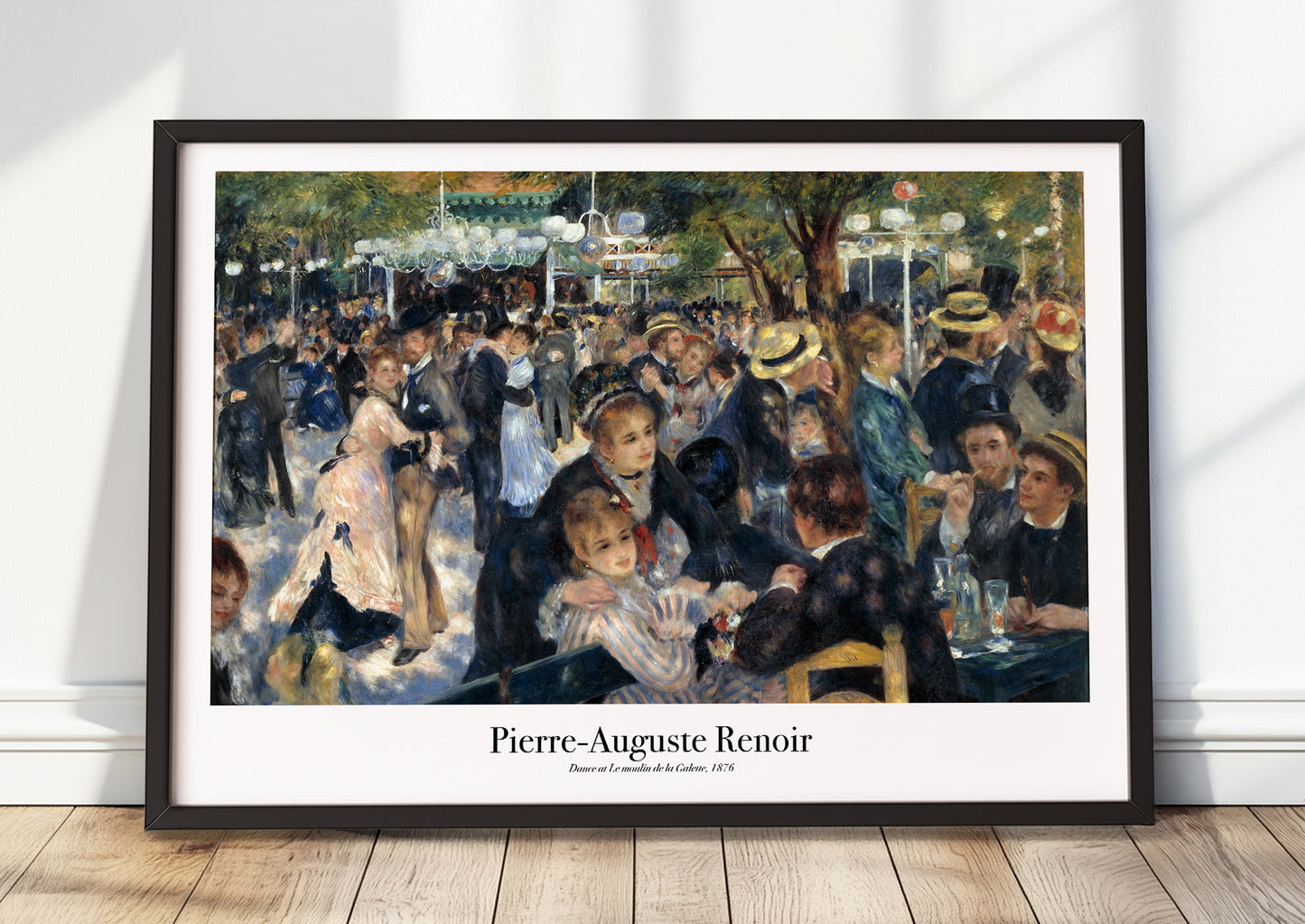 Dance at Le Moulin de la Galette von Pierre-Auguste Renoir Kunstdruck im schwarzen Rahmen, an Wand gelehnt