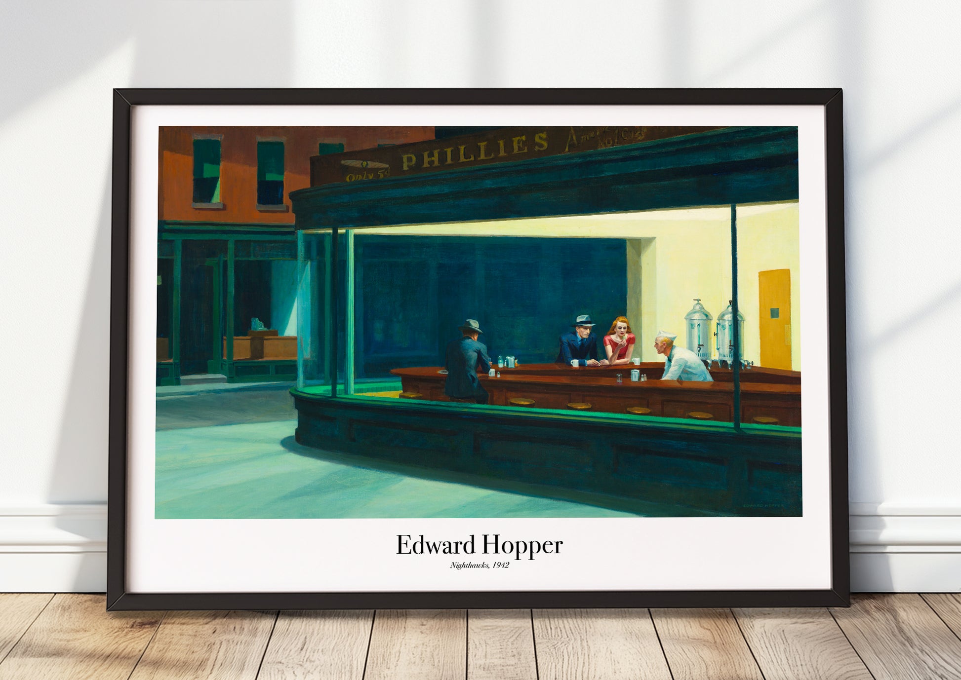 Nighthawks von Edward Hopper Kunstdruck im schwarzen Rahmen, an Wand gelehnt