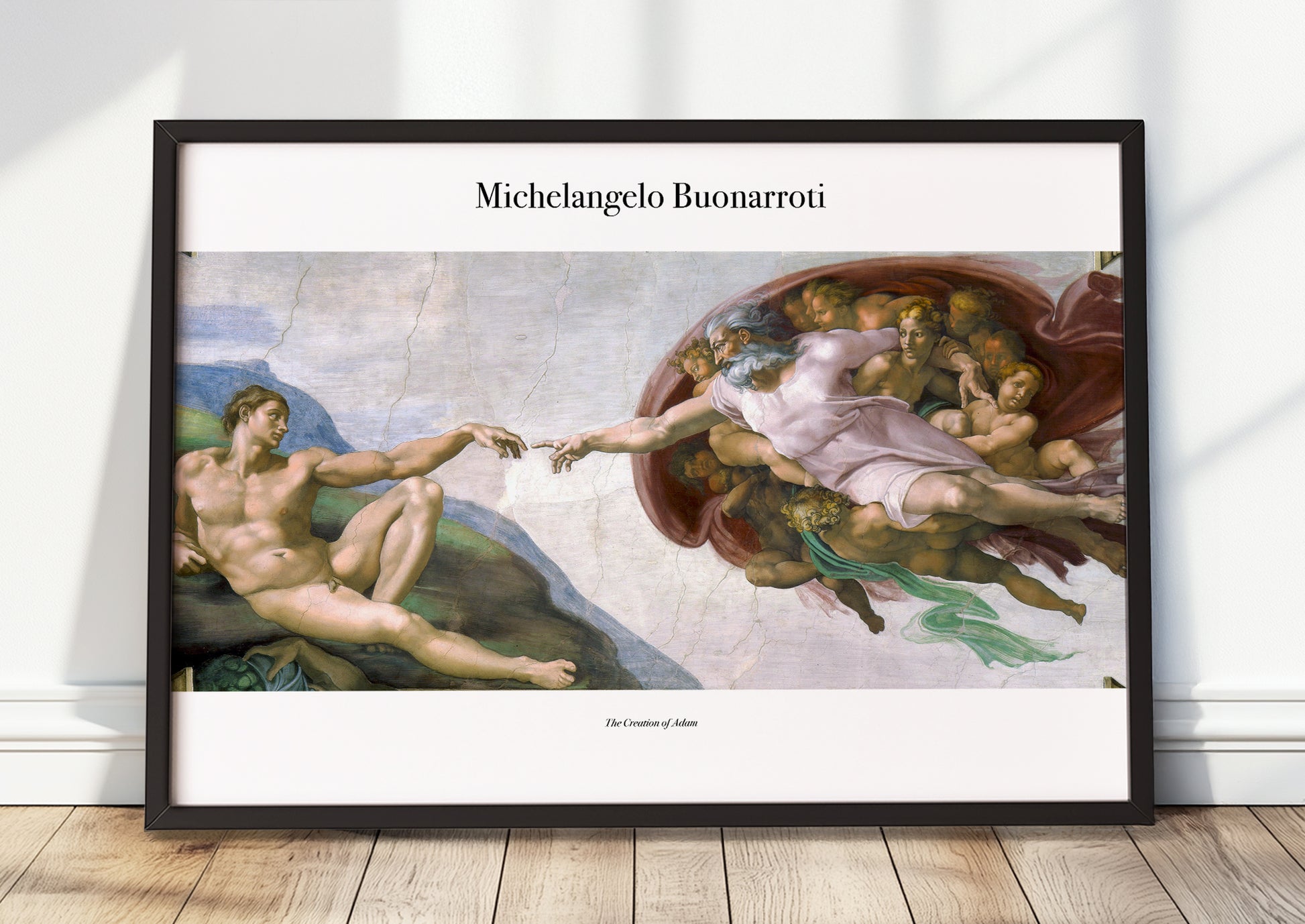 The Creation of Adam von Michelangelo Kunstdruck im schwarzen Rahmen, an Wand gelehnt