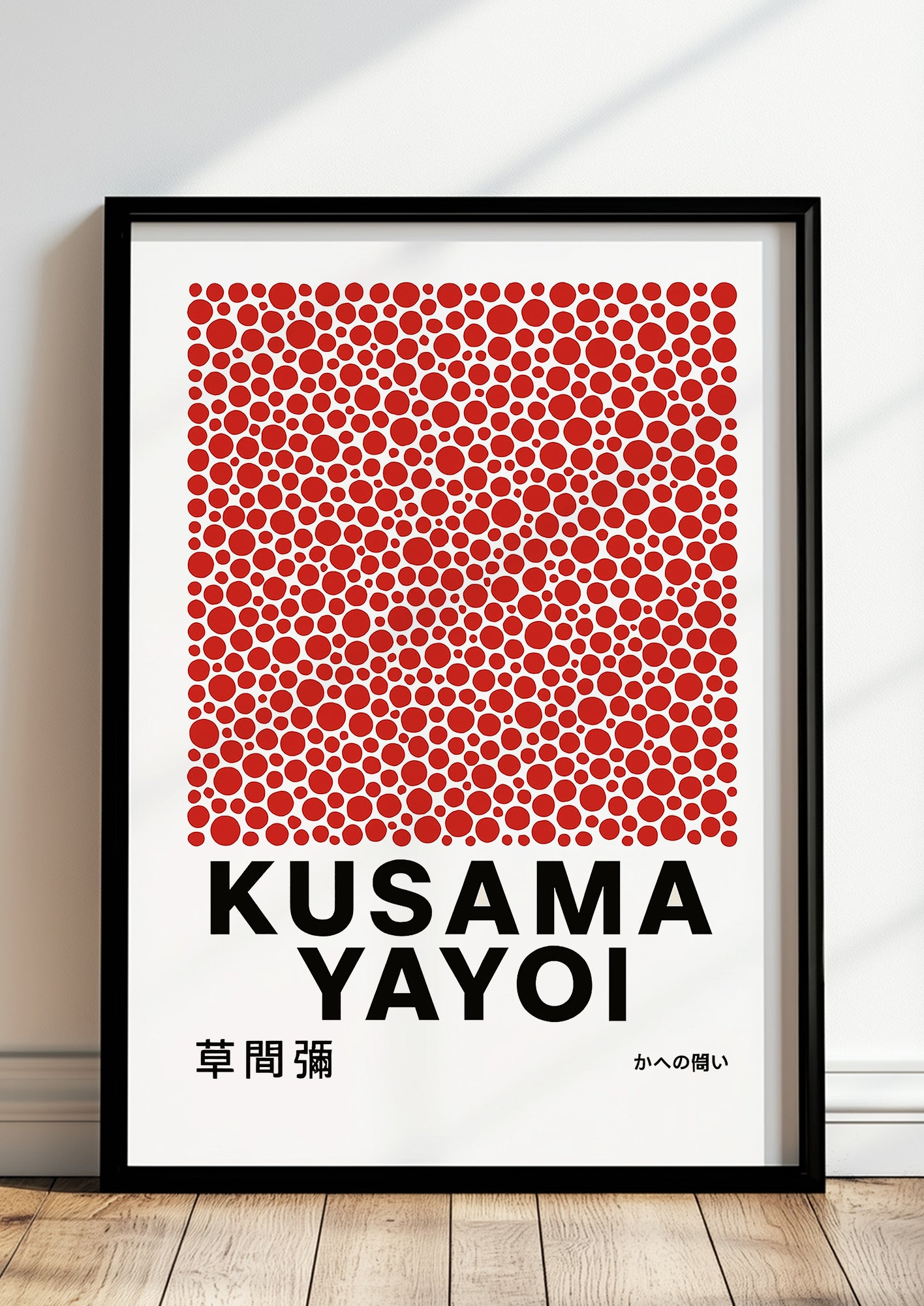 yayoi kusama red dots kunstwerk gerahmt in modernem wohnzimmer an der wand