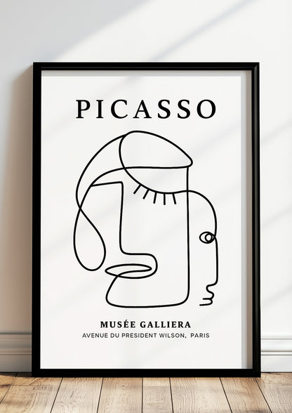 gerahmt in modernem raum Modern eingerichtetes Wohnzimmer mit abstraktem Picasso Line Drawing Poster an der Wand