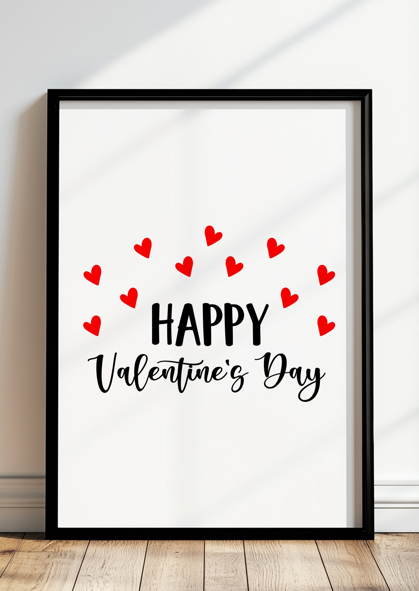 Das Valentinstag Poster gerahmt in einem hellen modernen Wohnzimmer über einem Sofa