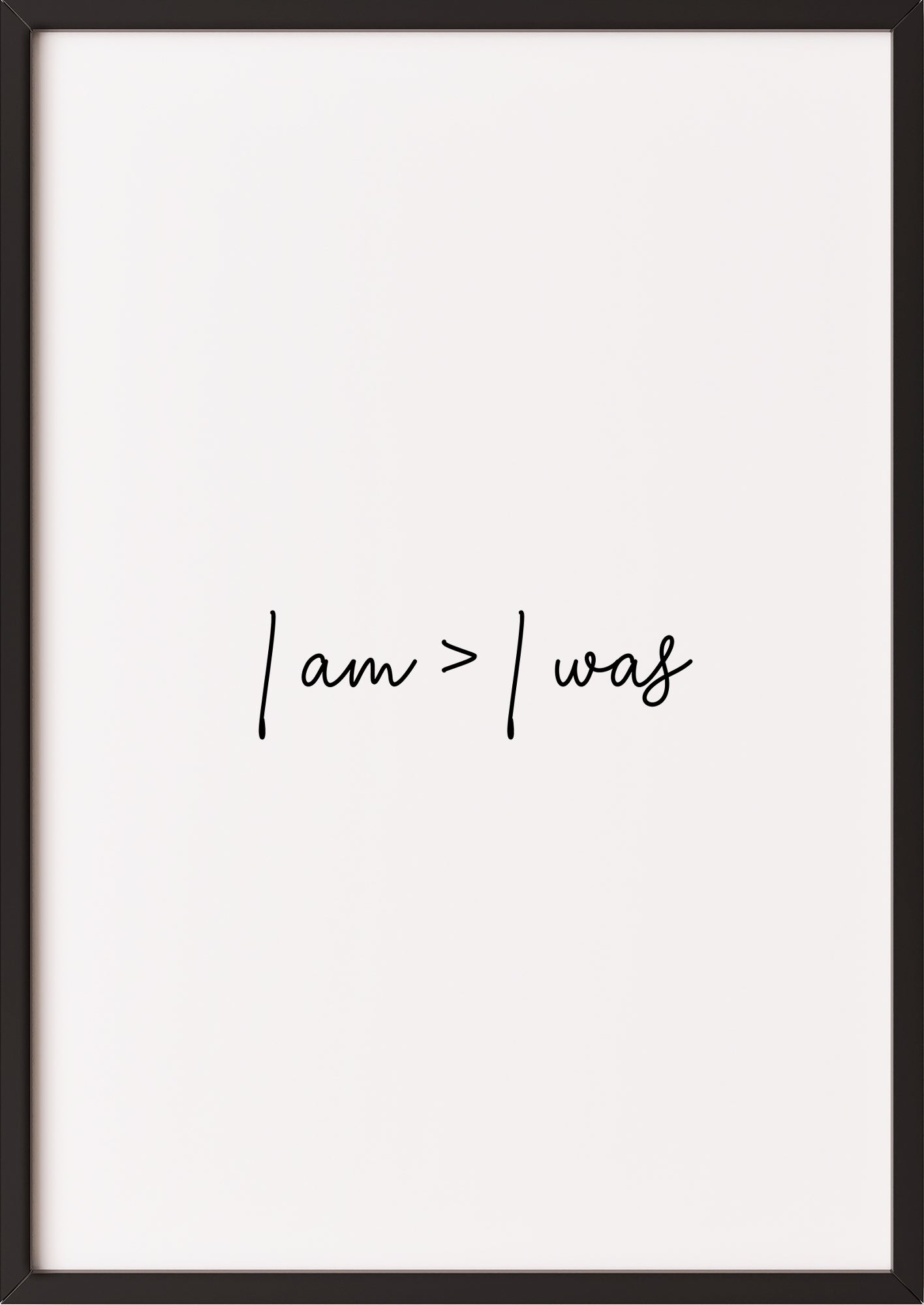 Hochformatiges Poster „i am > i was“ mit schwarzem Rahmen.