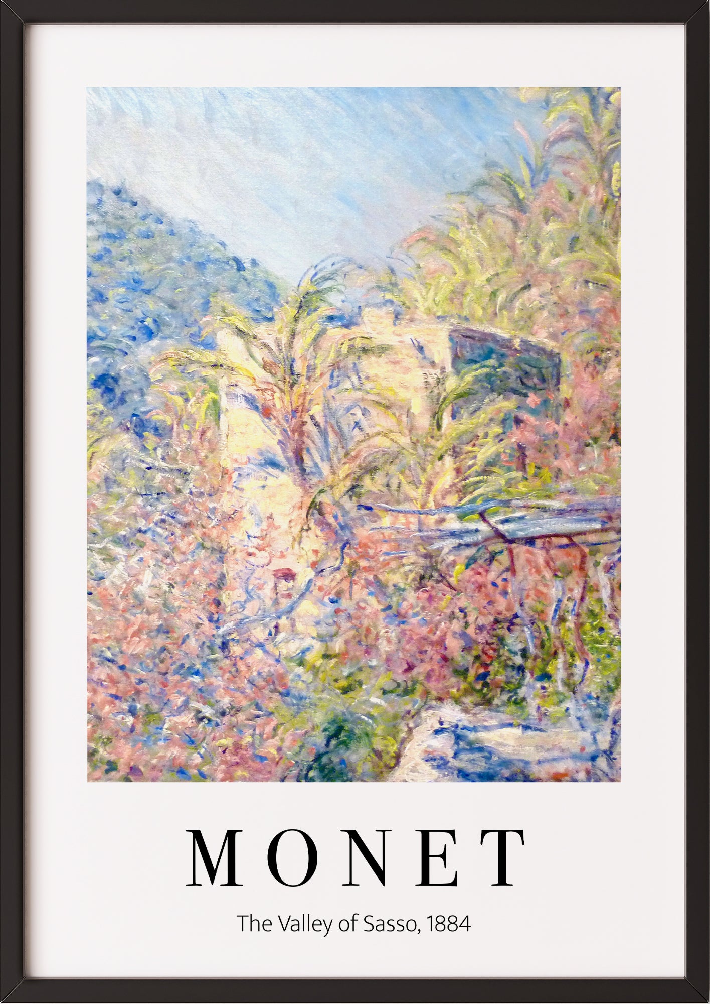 Frau hängt The Valley of the Sasso von Claude Monet als Poster in schwarzem Rahmen an die Wand