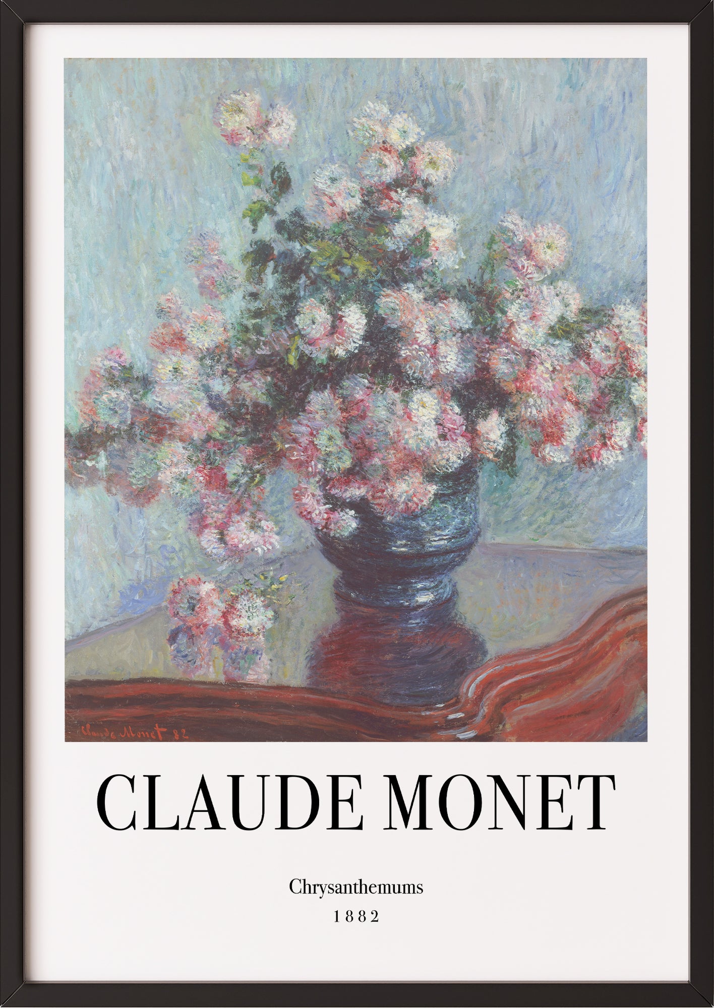 Frau hängt Chrysanthemums von Claude Monet als Poster in schwarzem Rahmen an die Wand