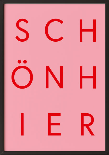 Rotes Typografieposter „SCHÖN HIER“ im schwarzen Holzrahmen, moderner Look