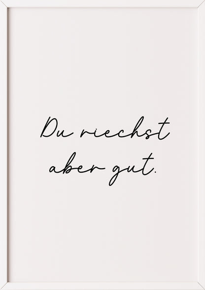 Hochformatiges Poster „Du riechst aber gut.“ mit weißem Rahmen, freigestellt.